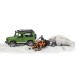 Внедорожник Bruder Land Rover Defender с прицепом снегоходом и водителем
